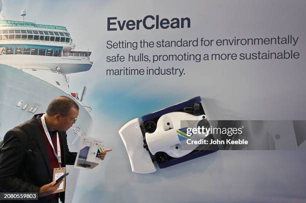 Visitor views a Greensea IQ EverClean Ship Hull Maintenance cleaning robot is displayed during the Oceanology International 2024 at ExCel on March...