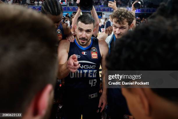 Chris Goulding of United celebrates with the team after winning game three of the NBL Semifinal Playoff Series between Melbourne United and Illawarra...