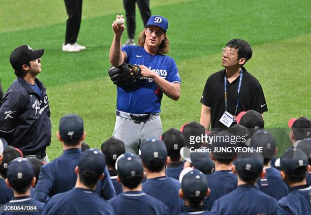 Los Angeles Dodgers' starting pitcher Tyler Glasnow participates in a skills clinic with local youth players during a baseball workout at Gocheok Sky...