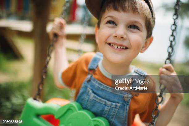 5,824 Boy On Swing Stock Photos, High-Res Pictures, and Images