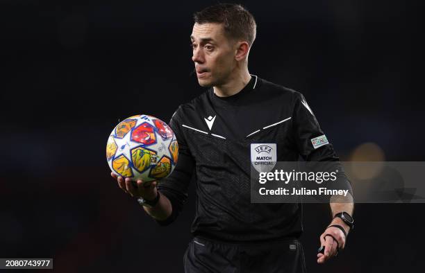 Referee Clement Turpin during the UEFA Champions League 2023/24 round of 16 second leg match between Arsenal FC and FC Porto at Emirates Stadium on...