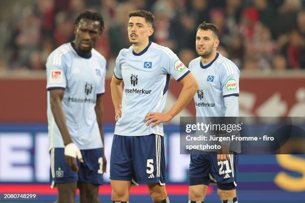 Bakery Jatta Dennis Hadzikadunic and Levin Öztunali of HSV disappointed after the Second Bundesliga match between Fortuna Düsseldorf and Hamburger SV...