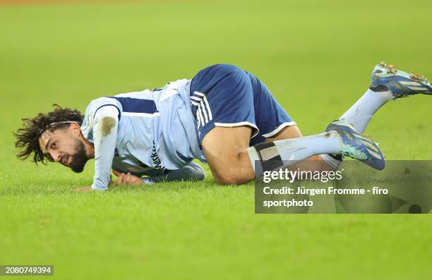 Immanuel Pherai of HSV injured on the ground during the Second Bundesliga match between Fortuna Düsseldorf and Hamburger SV at Merkur Spiel-Arena on...