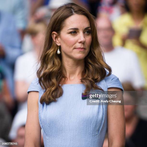 Catherine Duchess of Cambridge looks on after the Men's Singles final between Novak Djokovic of Serbia and Roger Federer of Switzerland during Day...