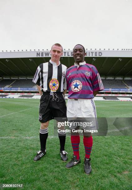 Newcastle United players Lee Clark and Ruel Fox at the launch at St James' Park on May 10, 1995 of the new adidas 'grandad collar home and away...