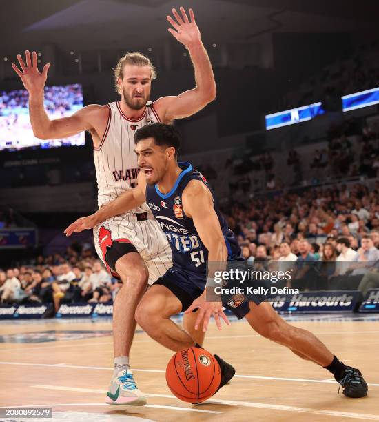 Shea Ili of United drives past Sam Froling of the Hawks during game three of the NBL Semifinal Playoff Series between Melbourne United and Illawarra...
