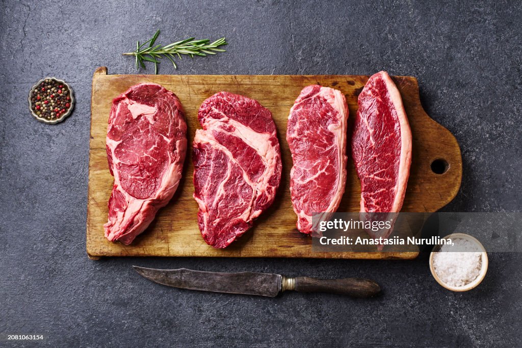 Variety of fresh Black Angus Prime raw beef steaks