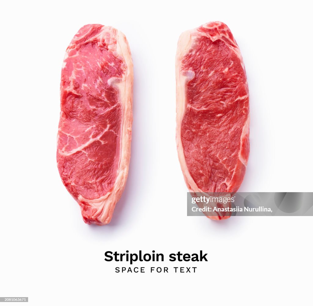 Black angus prime beef striploin steak isolated on white background with copy space