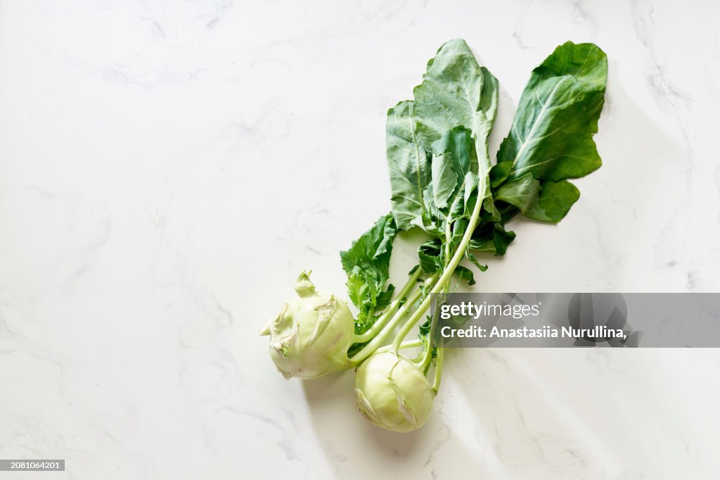 Fresh raw kohlrabi on white background