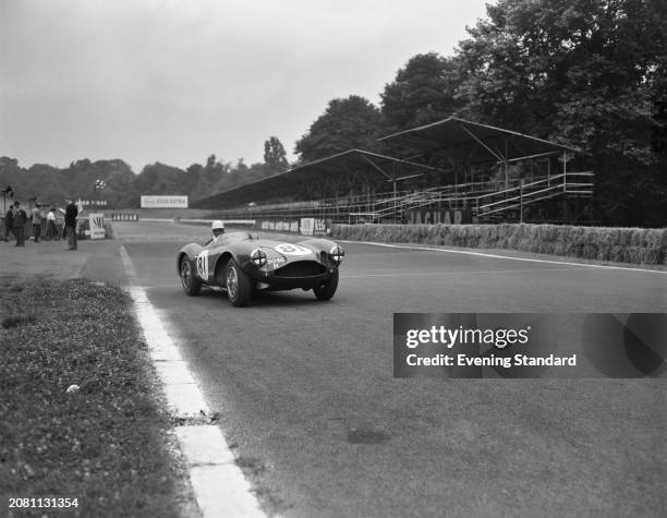 British racing driver Roy Salvadori driving a Aston Martin DB3S during the Crystal Palace International Race, Crystal Palace Circuit, London, July...