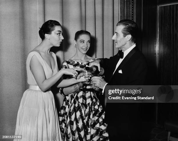 Ballerina Ludmilla Tcherina , left, and figure skater, dancer and actress Belita with choreographer Anton Dolin , September 20th 1955.