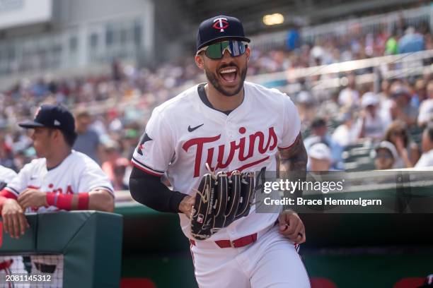 Carlos Correa of the Minnesota Twins looks on during a spring training game against the New York Yankees on March 9, 2024 at the Lee County Sports...