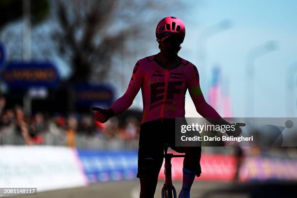 Silhouette of Alberto Bettiol of Italy and Team EF Education - EasyPost celebrating at finish line as race winner during the 105th Milano-Torino 2024...