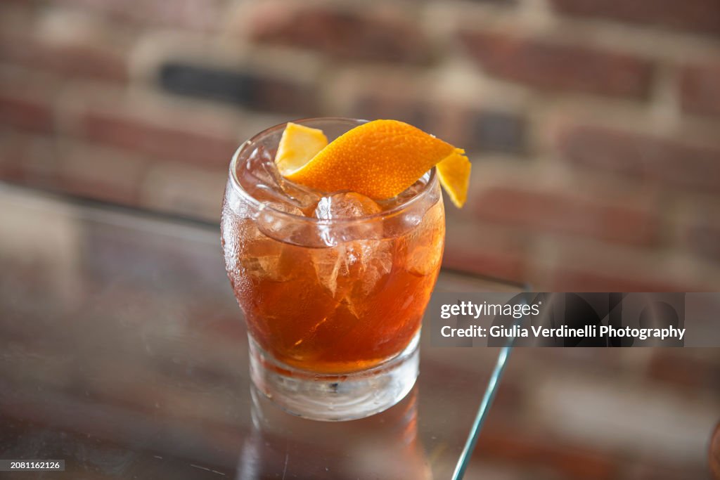 Negroni cocktail with orange peel