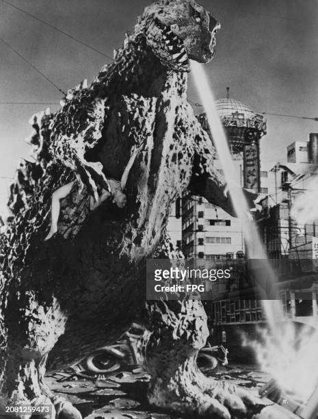 Godzilla emits its atomic breath as it levels Tokyo in a scene from 'Godzilla', Japan, 1954. Also known as 'Gojira', the monster movie was co-written...