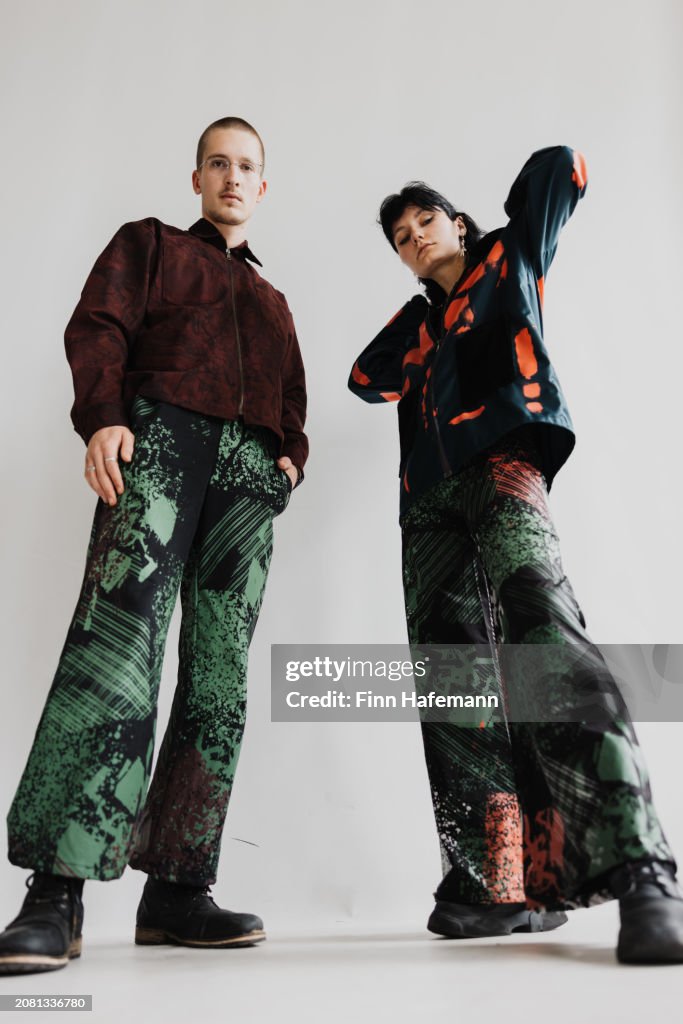 Stylish Boy And Girl Stand Wearing Baggy Street Fashion