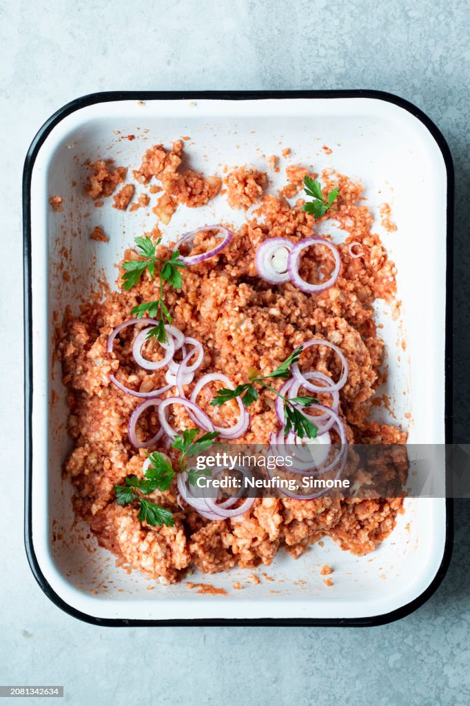 Vegan 'Mett' made from rice wafers, tomato puree, onions and spices