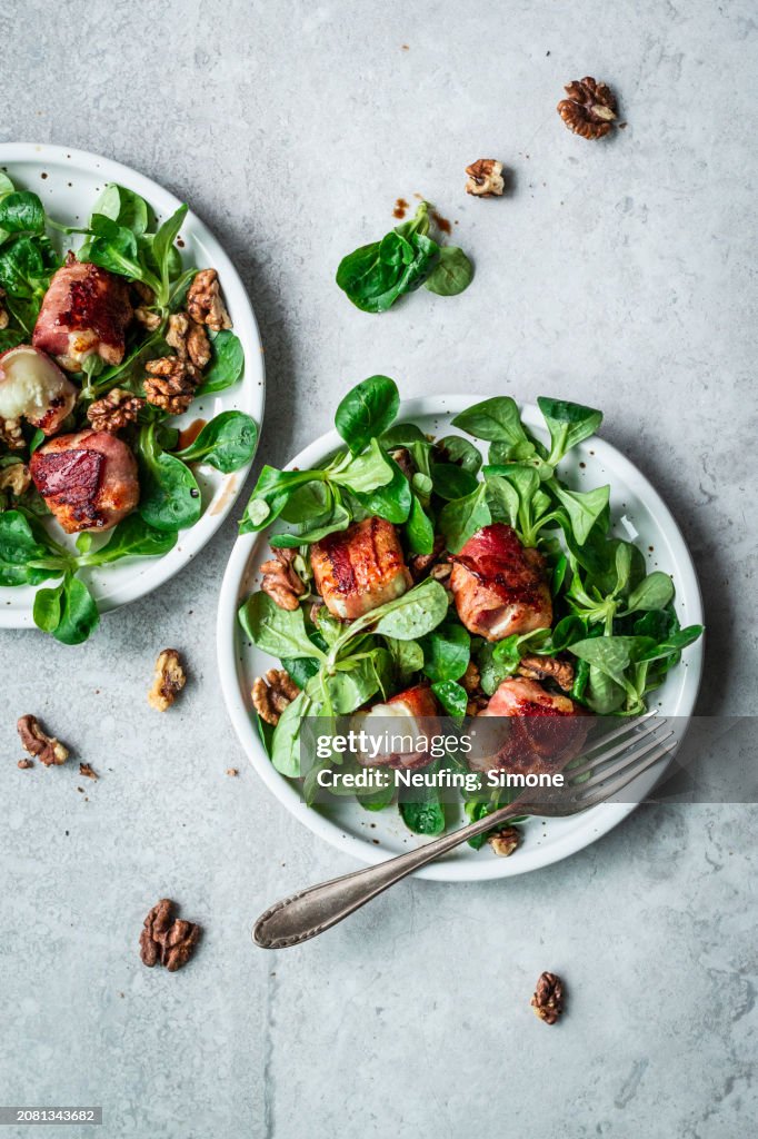 Lamb's lettuce with goat's cheese wrapped in bacon and walnuts