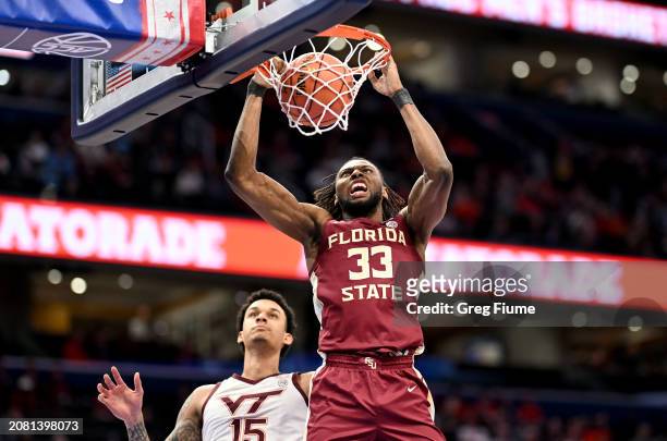 Jaylan Gainey of the Florida State Seminoles dunks the ball in the first half against Lynn Kidd of the Virginia Tech Hokies in the Second Round of...