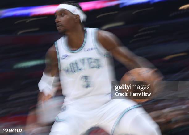 Jaden McDaniels of the Minnesota Timberwolves dribbles during a 118-100 Timberwolves win over the LA Clippers at Crypto.com Arena on March 12, 2024...