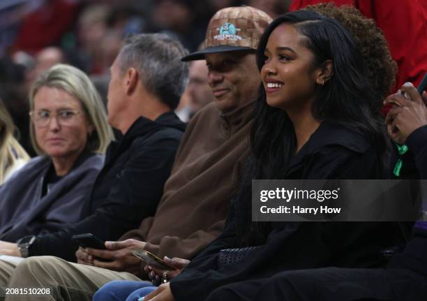 Singer H.E.R. Smiles court side during a 118-100 Minnesota Timberwolves win over the LA Clippers at Crypto.com Arena on March 12, 2024 in Los...