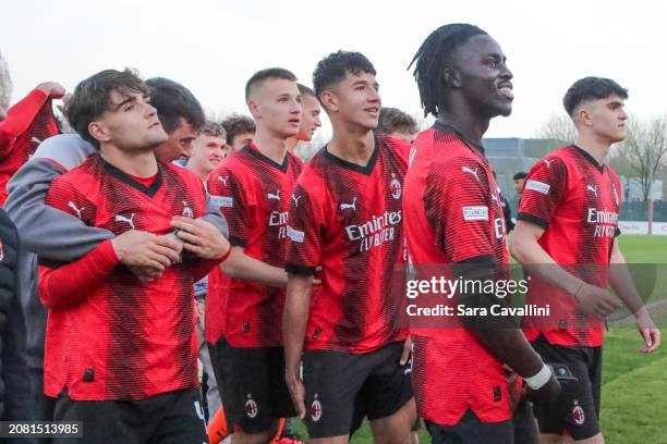 Milan players celebrates the victory at the end of the UEFA Youth League 2023/24 Quarter-final match between AC Milan and Real Madrid at Centro...