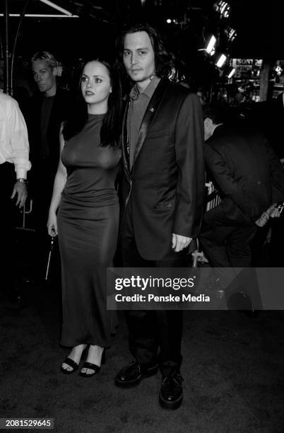 Christina Ricci and Johnny Depp attend the local premiere of "Sleepy Hollow" at Grauman's Chinese Theatre in Los Angeles, California, on November 17,...