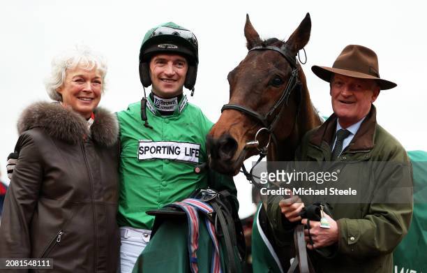 Trainer Willie Mullins looks on alongside Wife Jackie Mullins and Jockey and Son Patrick Mullins aas Jasmin De Vaux ridden by Patrick Mullins win the...