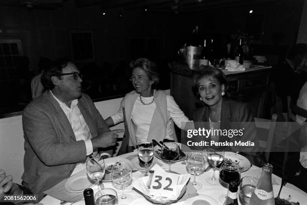 Guest, Elizabeth Rohatyn, and Barbara Walters attend a private screening of "The Cradle Will Rock" at the Bantry residence in the Wainscott...