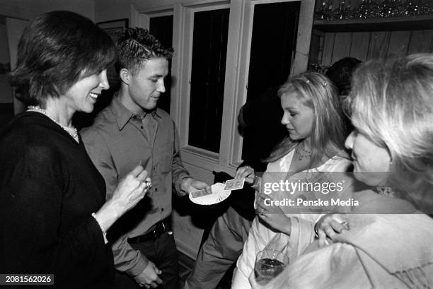 Sale Johnson, Rory Wheeler, Casey Johnson, and guest attend a private screening of "The Cradle Will Rock" at the Bantry residence in the Wainscott...