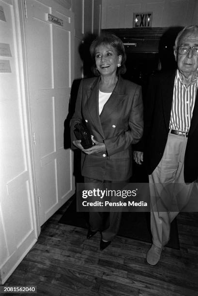 Barbara Walters and guest attend a private screening of "The Cradle Will Rock" at the Bantry residence in the Wainscott neighborhood of Long Island,...