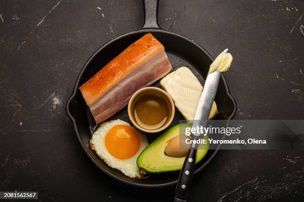 main keto foods - butter, olive oil, fried egg, avocado, fat meat bacon for ketogenic diet - avocato oil stock pictures, royalty-free photos & images