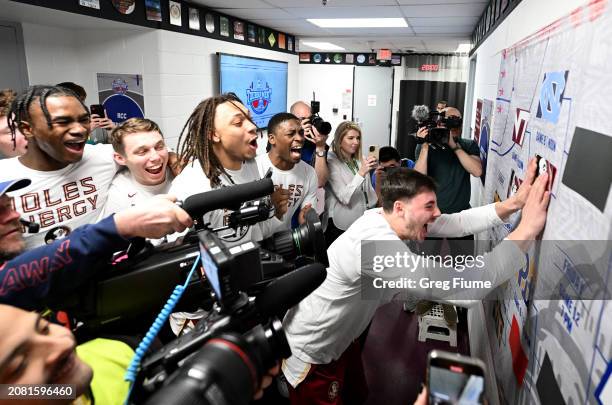 Max Thorpe of the Florida State Seminoles advances the sticker on the bracket after a 86-76 victory against the Virginia Tech Hokies in the Second...