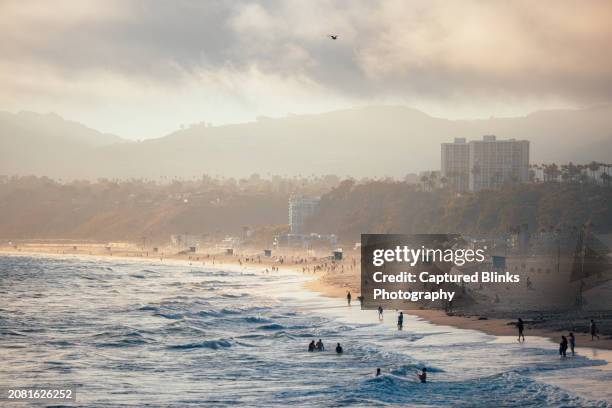 sunset view of santa monica beach in los angeles, california - sunset-boulevard-los-angeles stock pictures, royalty-free photos & images