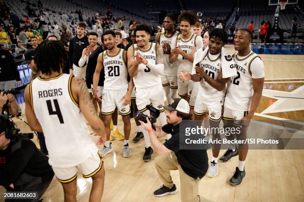 Colby Rogers of the Wichita State Shockers celebrates after defeating the Rice Owls during the AAC Men's Basketball Tournament - First Round between...