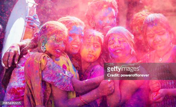group of friends celebrating holi in jaipur, india - indian holi stock pictures, royalty-free photos & images