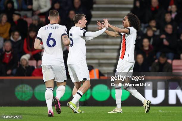 Tahith Chong of Luton Town celebrates with Alfie Doughty after scoring his team's first goal during the Premier League match between AFC Bournemouth...