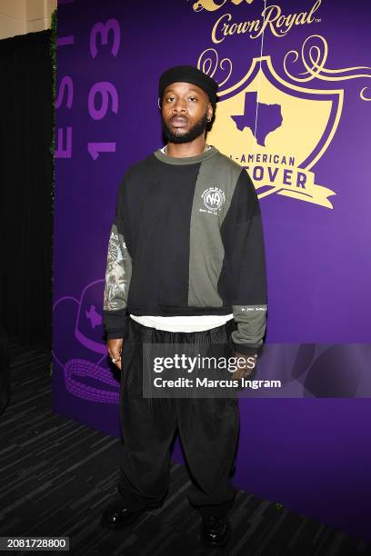 Maurice Kamara cheers to the All-American Takeover in the Crown Royal Lounge at Houston Rodeo at NRG Stadium on March 12, 2024 in Houston, Texas.