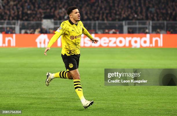 Jadon Sancho of Borussia Dortmund celebrates scoring his team's first goal during the UEFA Champions League 2023/24 round of 16 second leg match...