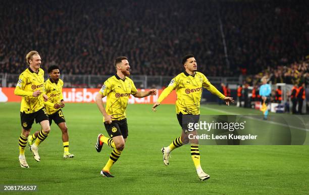 Jadon Sancho of Borussia Dortmund celebrates scoring his team's first goal during the UEFA Champions League 2023/24 round of 16 second leg match...