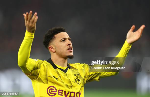 Jadon Sancho of Borussia Dortmund celebrates scoring his team's first goal during the UEFA Champions League 2023/24 round of 16 second leg match...