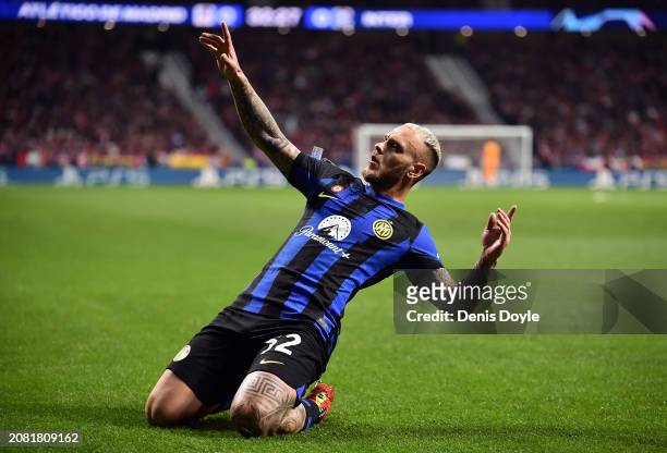 Federico Dimarco of FC Internazionale celebrates scoring his team's first goal during the UEFA Champions League 2023/24 round of 16 second leg match...
