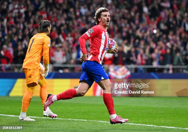 Antoine Griezmann of Atletico Madrid celebrates scoring his team's first goal during the UEFA Champions League 2023/24 round of 16 second leg match...