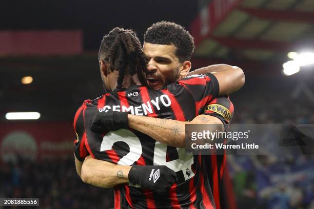 Antoine Semenyo of AFC Bournemouth celebrates scoring his team's fourth goal with teammate Dominic Solanke during the Premier League match between...