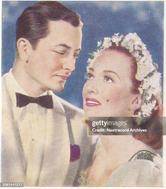 Collectible tobacco or cigarette card, 'Famous Love Scenes' series, published in 1939 by Godfrey Phillips Ltd, portraying famous onscreen movie...