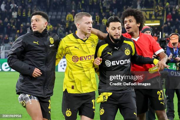 Jadon Sancho of Borussia Dortmund, Marco Reus of Borussia Dortmund, Ramy Bensebaini of Borussia Dortmund and Karim Adeyemi of Borussia Dortmund cheer...