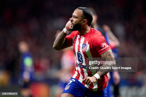 Memphis Depay of Atletico de Madrid celebrates after scoring the team's second goal during the UEFA Champions League 2023/24 round of 16 second leg...