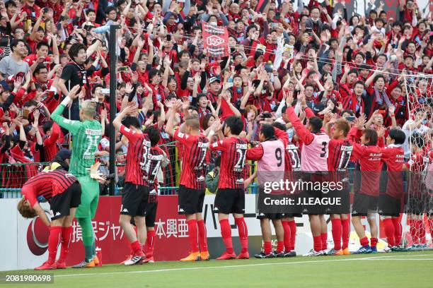 Hokkaido Consadole Sapporo players applaud fans after the team's 2-1 victory in the J.League J1 match between Kashiwa Reysol and Hokkaido Consadole...