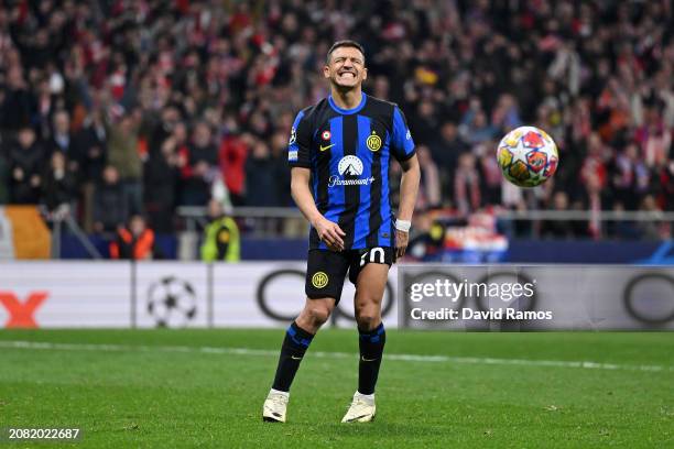 Alexis Sanchez of FC Internazionale reacts after missing the team's second penalty in the penalty shoot out during the UEFA Champions League 2023/24...