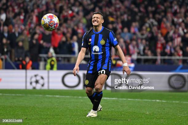 Alexis Sanchez of FC Internazionale reacts after missing the team's second penalty in the penalty shoot out during the UEFA Champions League 2023/24...
